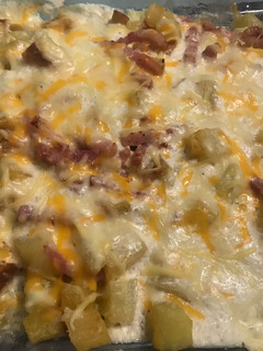 Una foto de Bacon cheese fríes (patatas Foster)