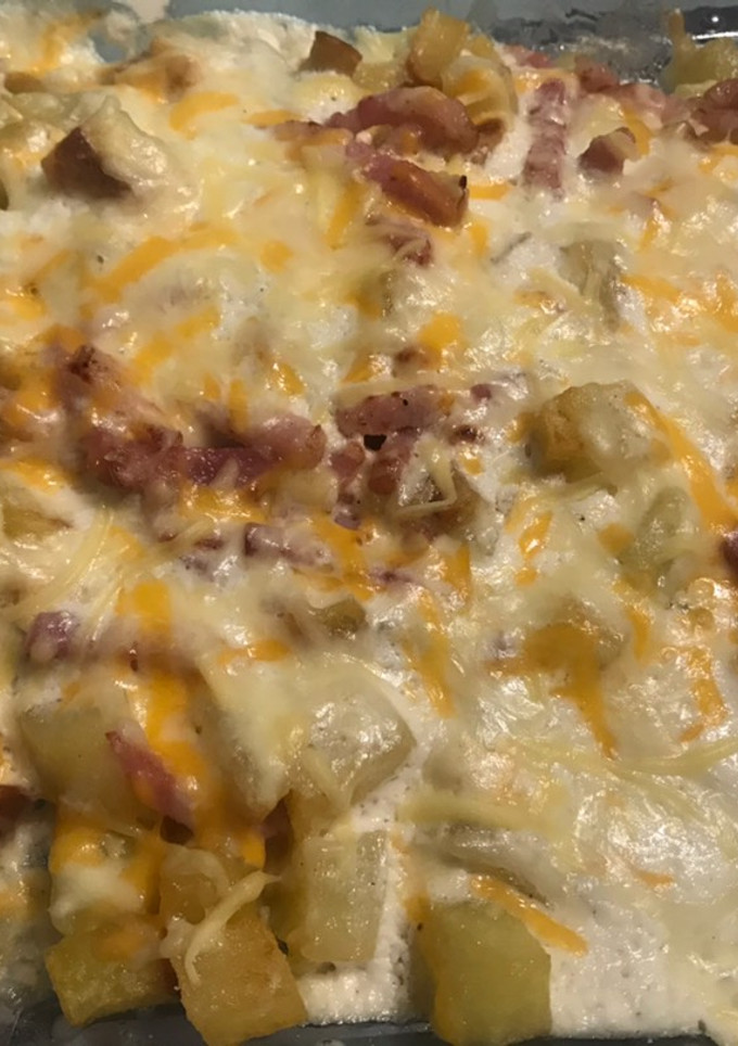 Una foto de Bacon cheese fríes (patatas Foster)