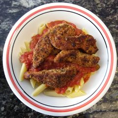 A picture of Cajun Chicken over Pasta.