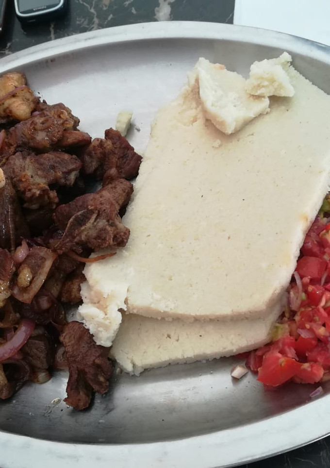 A picture of Beef fry & Ugali.