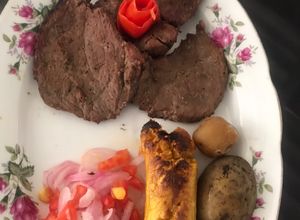 Una foto de Carne asada a la brasa
