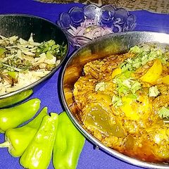 A picture of Mash ke dal or achari baingan.