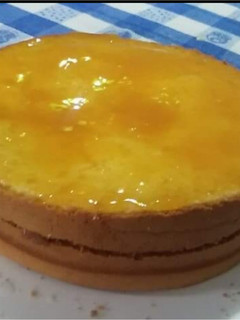 Una foto de Torta naranja/durazno Vegana fácil y rica