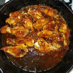 A picture of Spicy sticky butter wings.