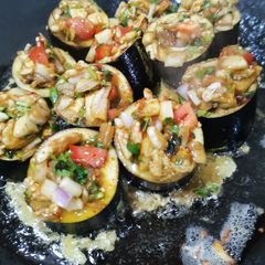 A picture of Eggplants with egg.