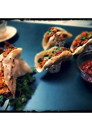 A picture of Tandoori Chicken tacos.