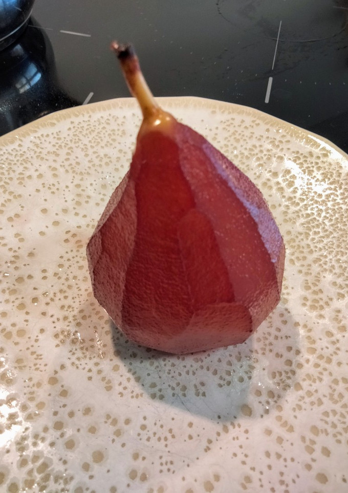 Una foto de Peras al vino