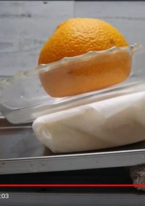A picture of Reduce the extra water of Tofu.