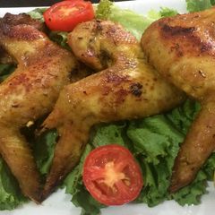 A picture of Honey glazed oven baked chicken wings.