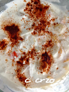 Una foto de Fruta con queso y canela