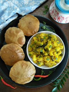 A picture of POORI BHAAJI (Maharashtrian Style Potato Vegetable With Poori).