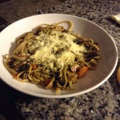 A picture of Linguinne Pasta with Dandelion Greens.