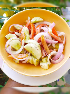 A picture of Cucumber and Tomato Salad.