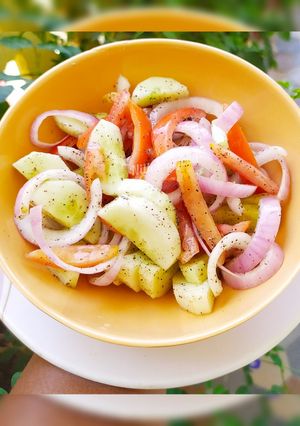 A picture of Cucumber and Tomato Salad.