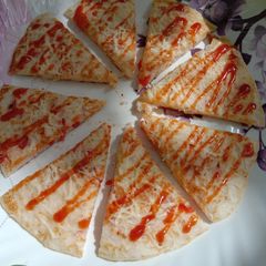 Cheesy Uttapam A picture of Cheesy Uttapam.