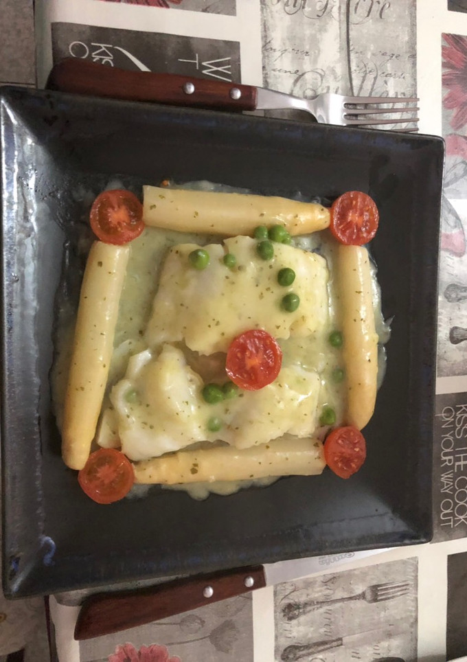 Una foto de Bacalao en salsa verde