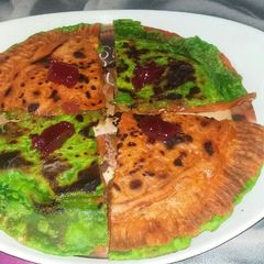 Stuffed Caramalized Mix Fruits Colourful Paratha A picture of Stuffed Caramalized Mix Fruits Colourful Paratha.