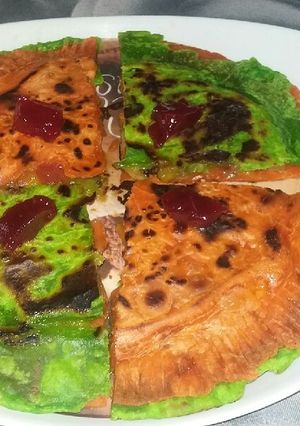 A picture of Stuffed Caramalized Mix Fruits Colourful Paratha.