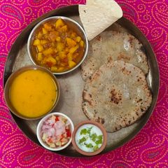 A picture of Kathiyawadi thali with real desi tadka.