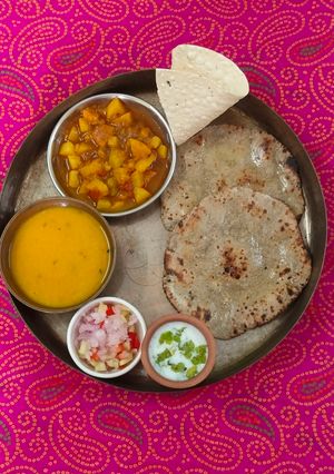 A picture of Kathiyawadi thali with real desi tadka.