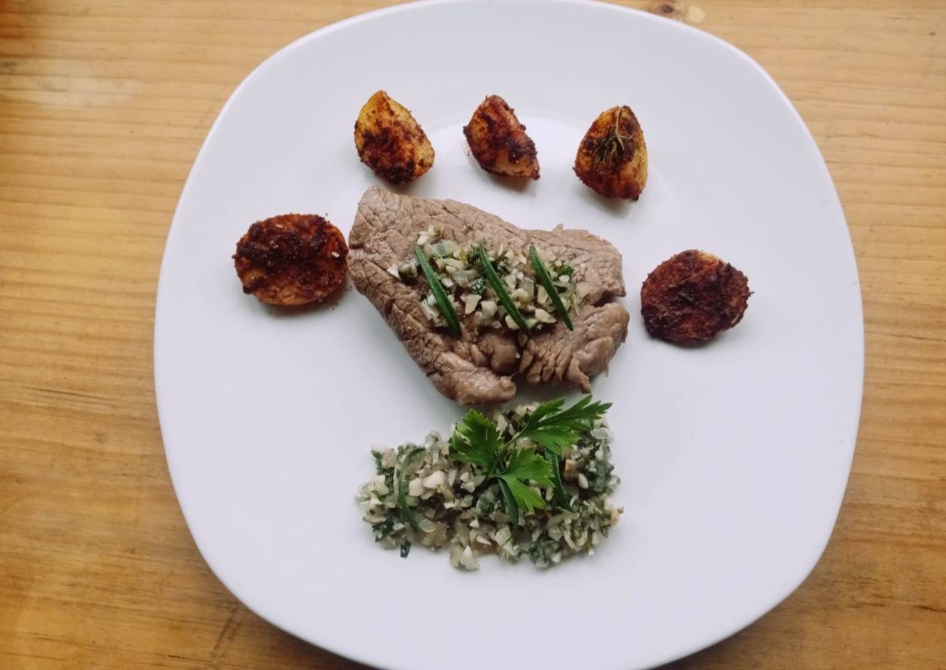 Filete al perejil con papas rústicas