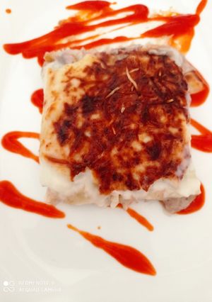 Una foto de Canelones rossini