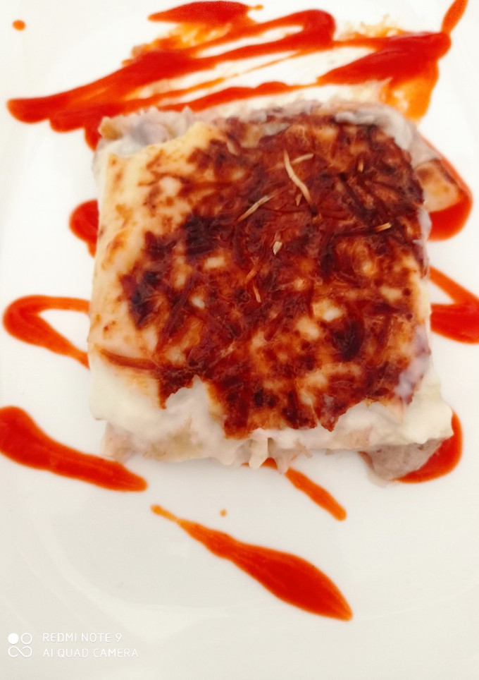 Una foto de Canelones rossini