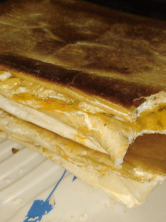 A picture of Toasted bread and egg.