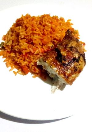 A picture of Hot Jollof Rice and Chicken.