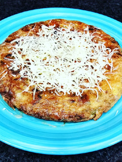 Una foto de Tortilla jugosa de berenjena y queso al romero