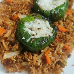 A picture of Paneer cheese stuffed capsicum.