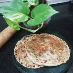 A picture of Walnut & Potato stuffed Paratha.