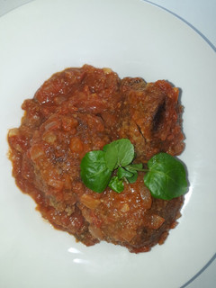Una foto de Albóndigas de soya, con salsa natural de tomates🍅