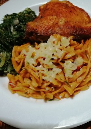 A picture of Pasta in Arabiatta sauce.