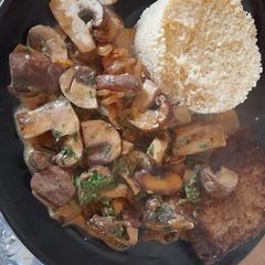 A picture of Steak and chestnut champignon sauce.