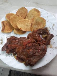 Una foto de Caldereta de cuello de cordero