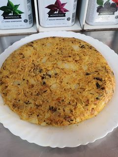 Una foto de Tortilla de patatas con mejillones