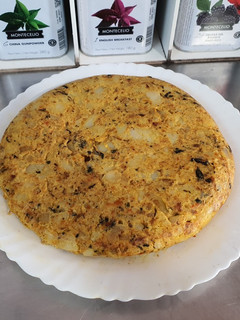 Una foto de Tortilla de patatas con mejillones