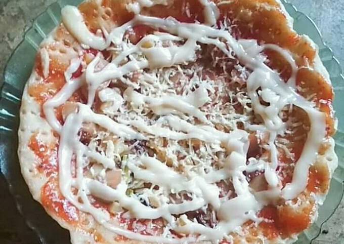 Bagaimana Menyiapkan Pizza teflon rumahan yang Bisa Manjain Lidah