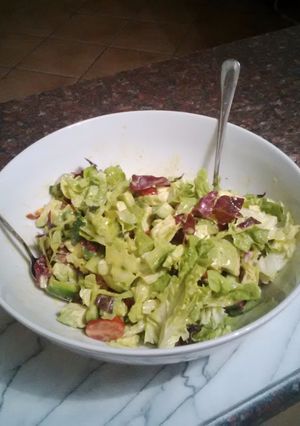 A picture of Bornmann's Vegan Green Salad with Tahini Dressing.