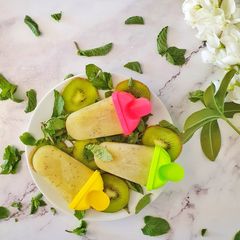 A picture of Kiwi ice popsicles.