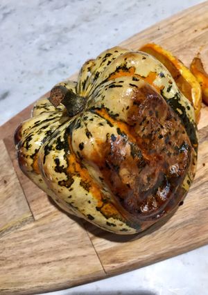 A picture of Crispy Skin Whole Roasted Squash.