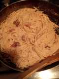Spaghetti with Bacon in Cheese and Tomato Sauce