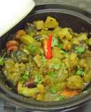 Chingri diye Panch Mishali Torkari (Bengali Dish cooked in a Moroccan Tagine Pot)