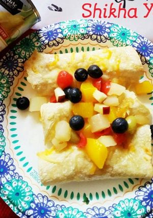 A picture of Tropical Fruit Enchilada wrapped in Mango Coconut Chutney & Pineapple glaze.