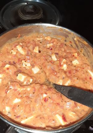 A picture of Pizza sauce with paneer(jain).