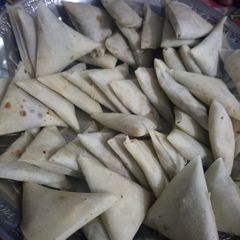 A picture of Keema samosey ready to freeze.