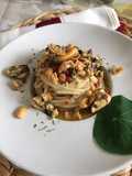 Spaghetti con cozze, taralli e bottarga