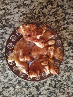 Una foto de Manitas de cerdo cocidas a la brasa