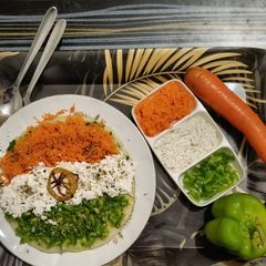 A picture of Tricolor nutritious Uttapam.